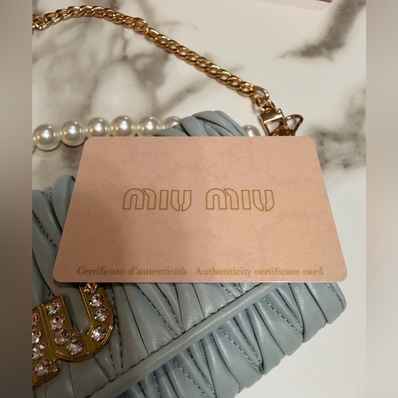 Miu Miu Matelasse Bifold Long Wallet Logo
Leather Cielo Blue - Picture 12 of 16